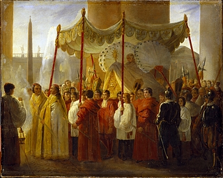 Pius 8. bliver ved Kristi legemsfest båret igennem Peterskirkens kolonnade