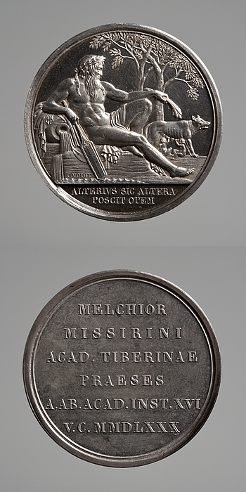 Medalje forside: Tiberflodens Gud og Romulus og Remus som dier ulvinden. Medalje bagside: Indskrift