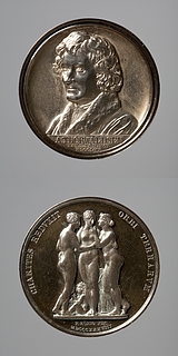 Medalje forside: Portræt af Thorvaldsen. Medalje bagside: Gratierne og Amor