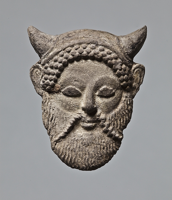 Appliqué in the shape of an Acheloos mask. Western Greek H1271