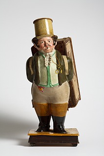 Male Figure carrying a Box on his back