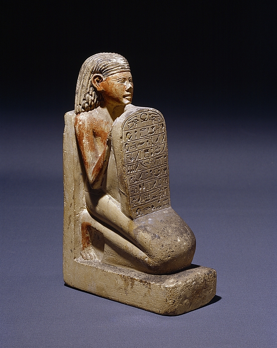 Statuette af en knælende mand med en stele. Ægyptisk, attende dynasti