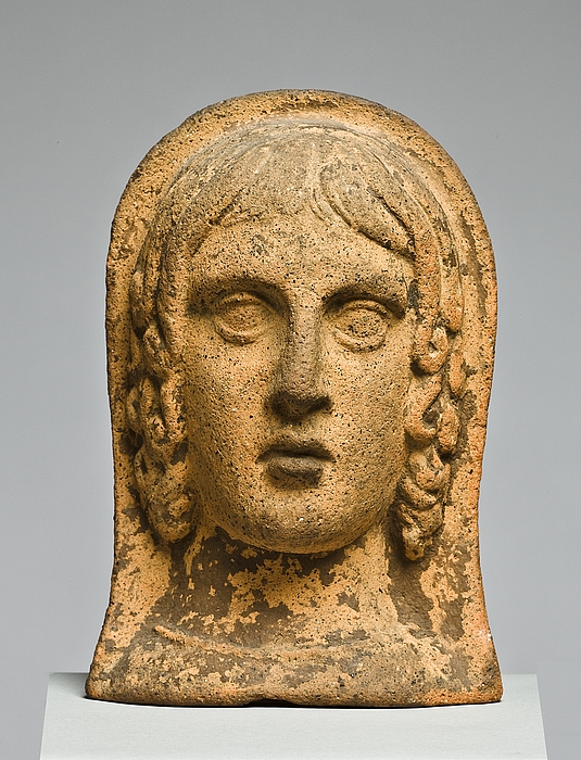 Votivhoved af en kvinde. Etruskisk-romersk